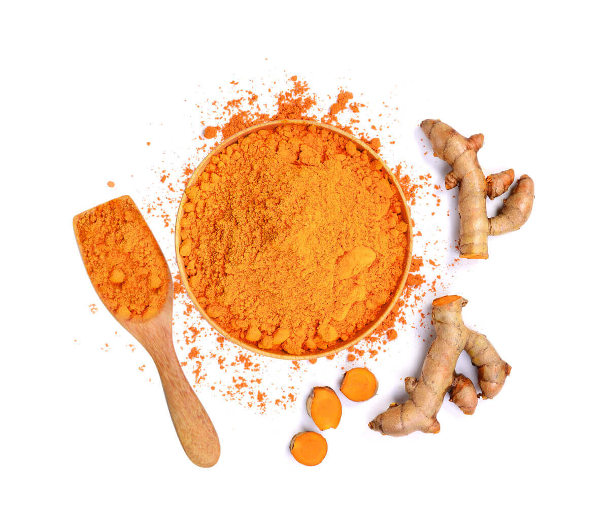 pieces of turmeric and bowl of powdered turmeric